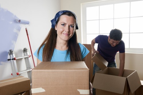 Moving team handling furniture and access challenges in South London