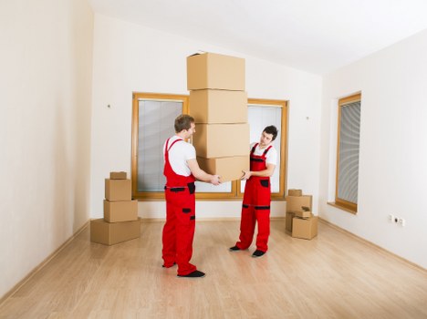 Office furniture and equipment being moved in South London